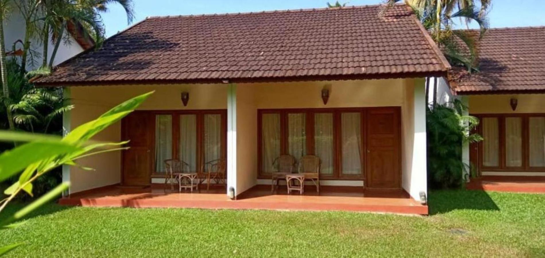Abad Whispering Palms Hotel Kumarakom Luaran gambar