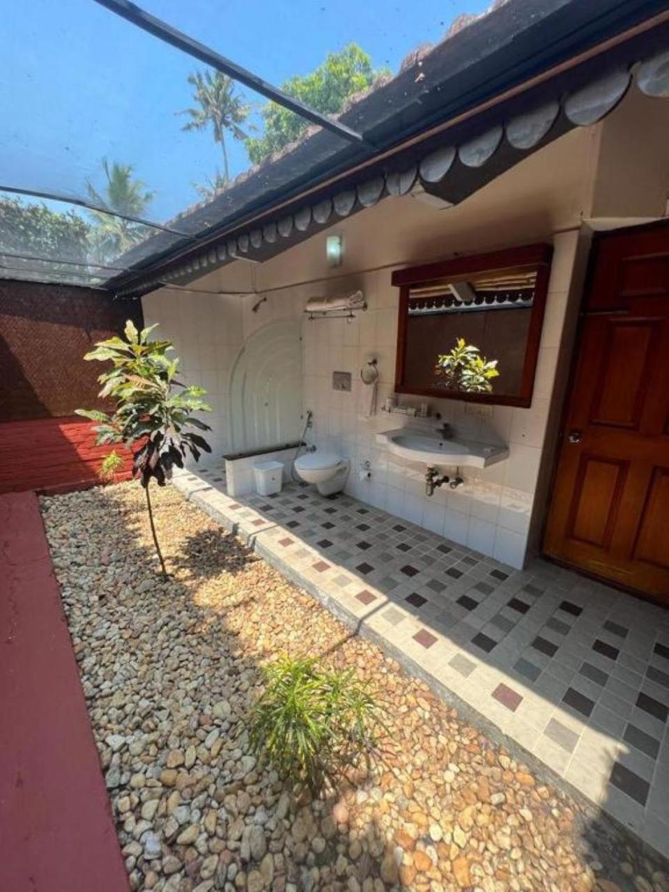 Abad Whispering Palms Hotel Kumarakom Luaran gambar